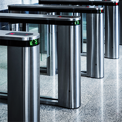 A row of security turnstiles.